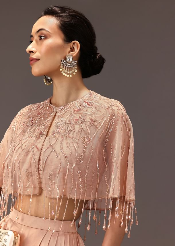 Nude Pleated Blouse With Tassel Cape And Dhoti Pants