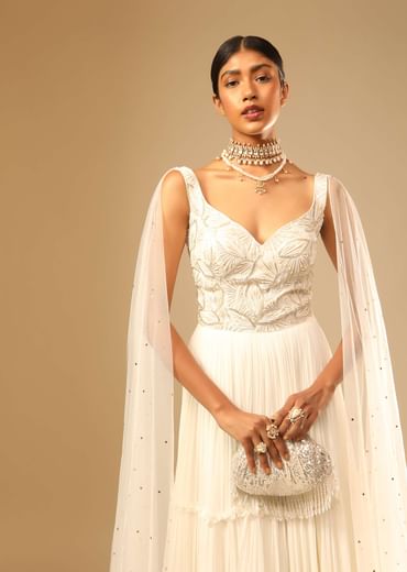 Off White Gown In Georgette With Tiered Flare And Hand Embroidered Leaf Motifs On The Bodice