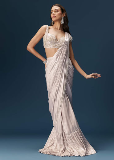Off White Saree With Embroidered Blouse