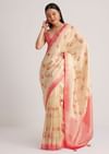 Off White Banarasi Silk Saree With Woven Contrast Red Border