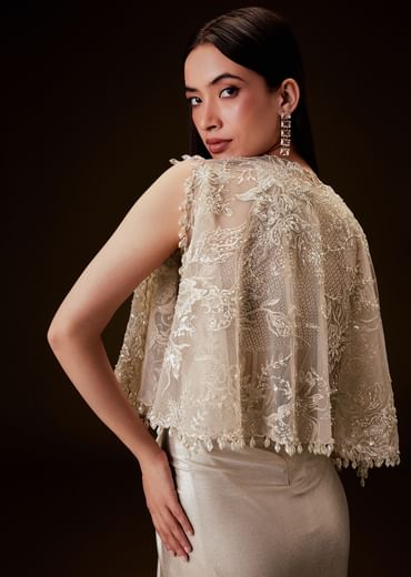 Off White Corset Gown With Sheer Waistline And Embroidered Cape