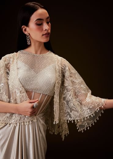 Off White Corset Gown With Sheer Waistline And Embroidered Cape