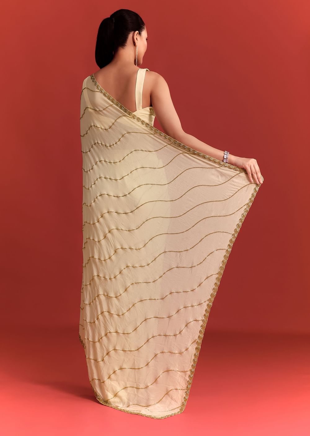 Off White Saree In Chinnon With Cutdana Embroidery