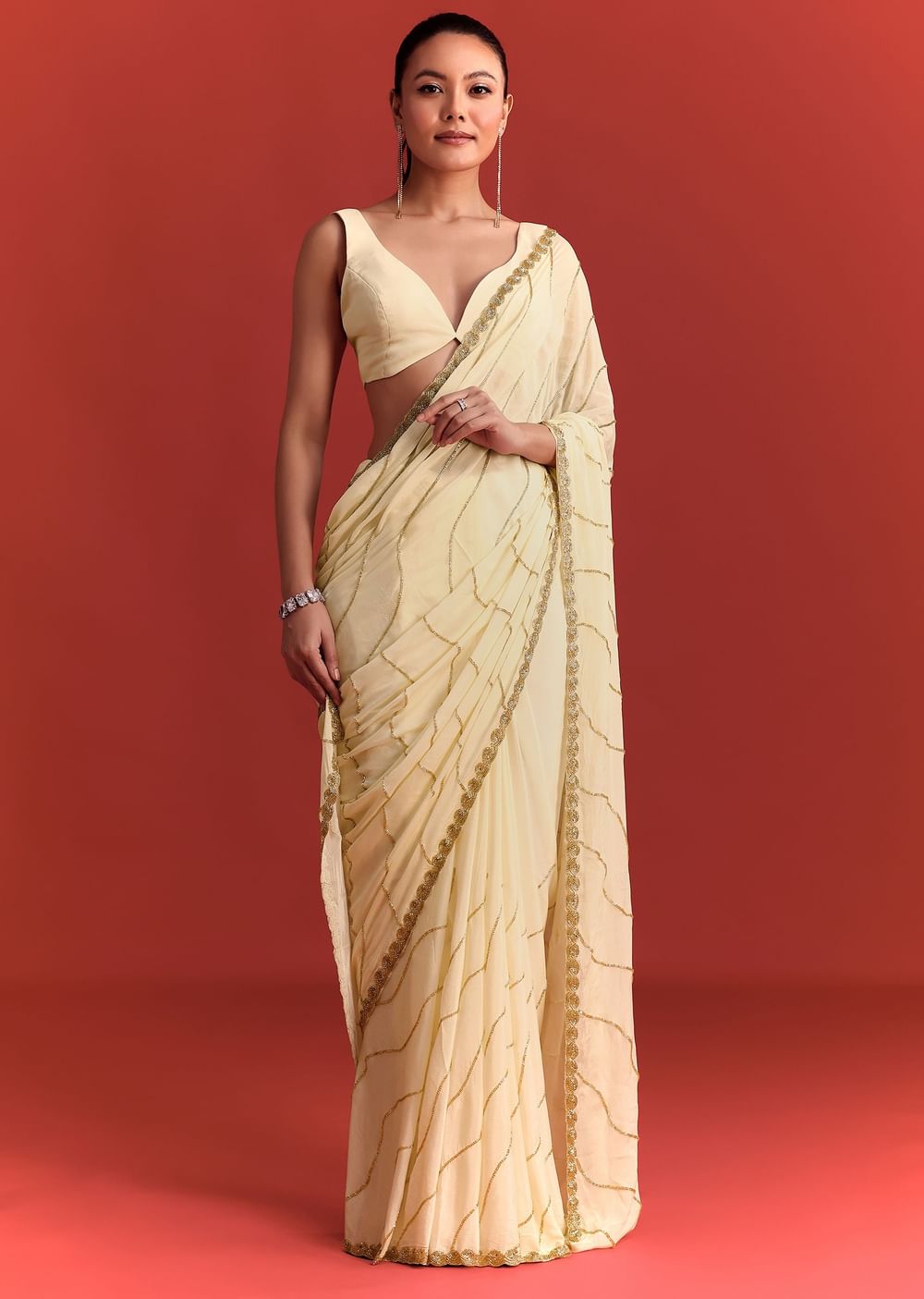 Off White Saree In Chinnon With Cutdana Embroidery