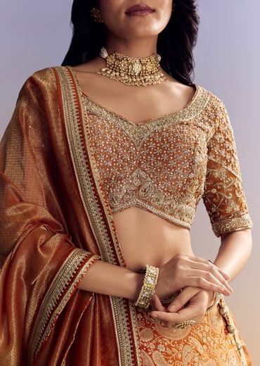 Orange Banarasi Lehenga With Embroidered Choli And Dupatta
