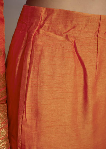Orange Silk Anarkali Suit With Heavy Embroidery And Weave Border