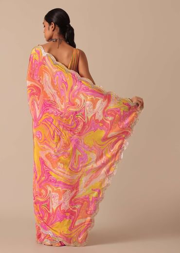 Orange Muslin Saree With Kaleidoscope Prints And Unstitched Blouse Piece