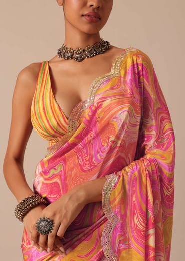 Orange Muslin Saree With Kaleidoscope Prints And Unstitched Blouse Piece