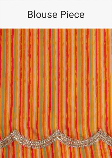 Orange Muslin Saree With Kaleidoscope Prints And Unstitched Blouse Piece