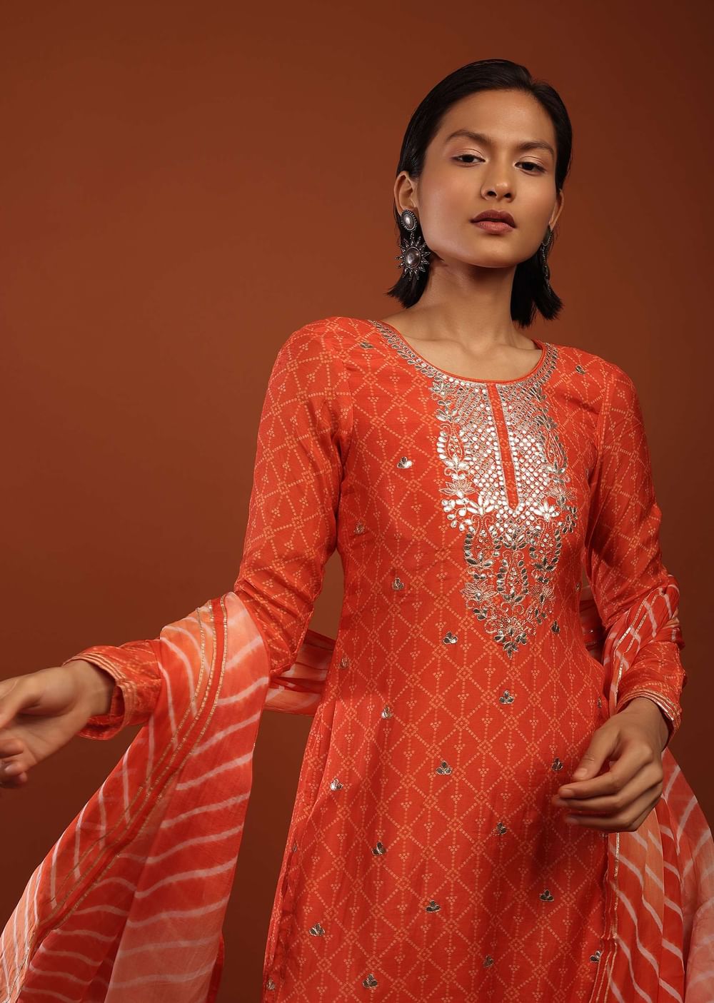 Tangerine Orange Suit With Bandhani Print And Gotta Patti Embrodiered Yoke Design
