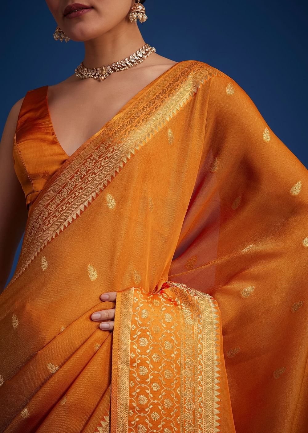 Orange Tissue Silk Saree With Zari Border And Butti Work