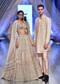 Oyster Organza Lehenga Adorned With Cut Dana Embroidery And A 3/4Th Sleeves Crop Top With A Deep V Neckline