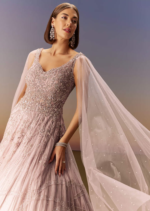 Pastel Pink Gown With Embellished Shoulder Cape Trails Pastel Pink Gown With Embellished Shoulder Cape Trails