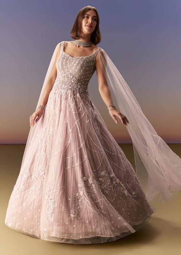 Pastel Pink Gown With Sheer Cape Drape And Heavy Embroidery Pastel Pink Gown With Sheer Cape Drape And Heavy Embroidery