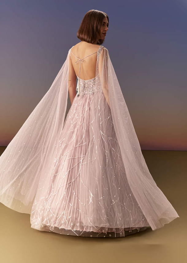 Pastel Pink Gown With Sheer Cape Drape And Heavy Embroidery Pastel Pink Gown With Sheer Cape Drape And Heavy Embroidery