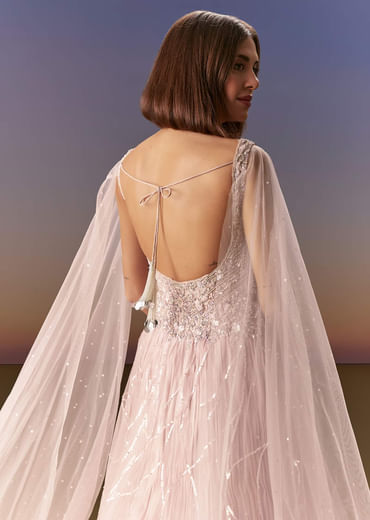 Pastel Pink Gown With Sheer Cape Drape And Heavy Embroidery