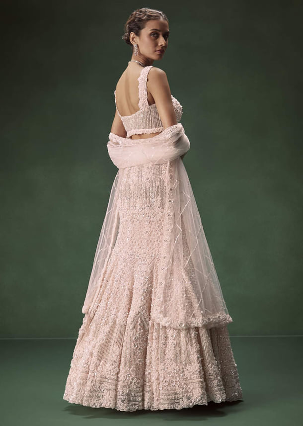 Pastel Pink Mermaid Bridal Lehenga With Intricate Embellishments