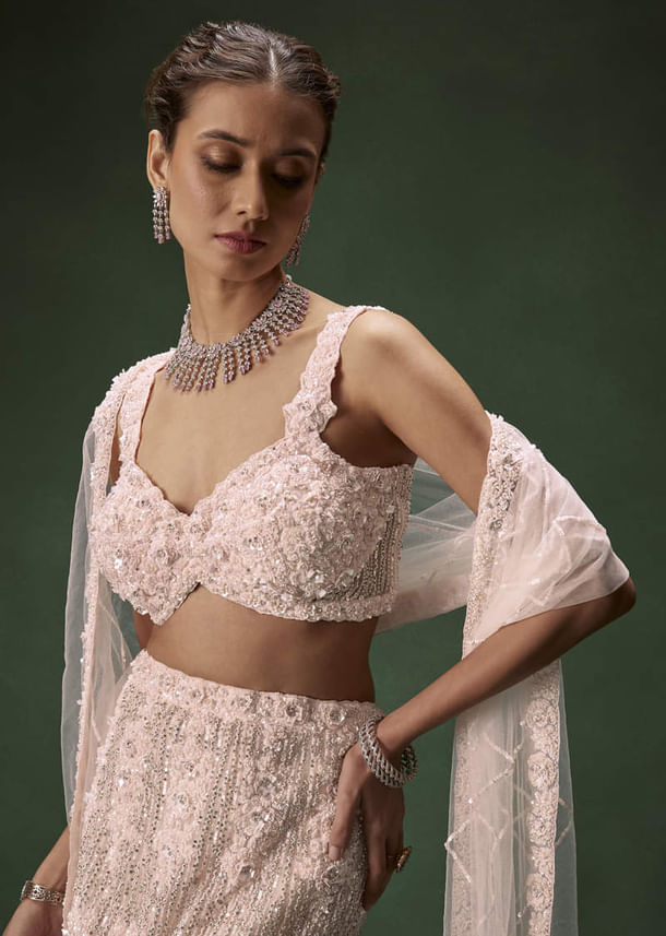 Pastel Pink Mermaid Bridal Lehenga With Intricate Embellishments