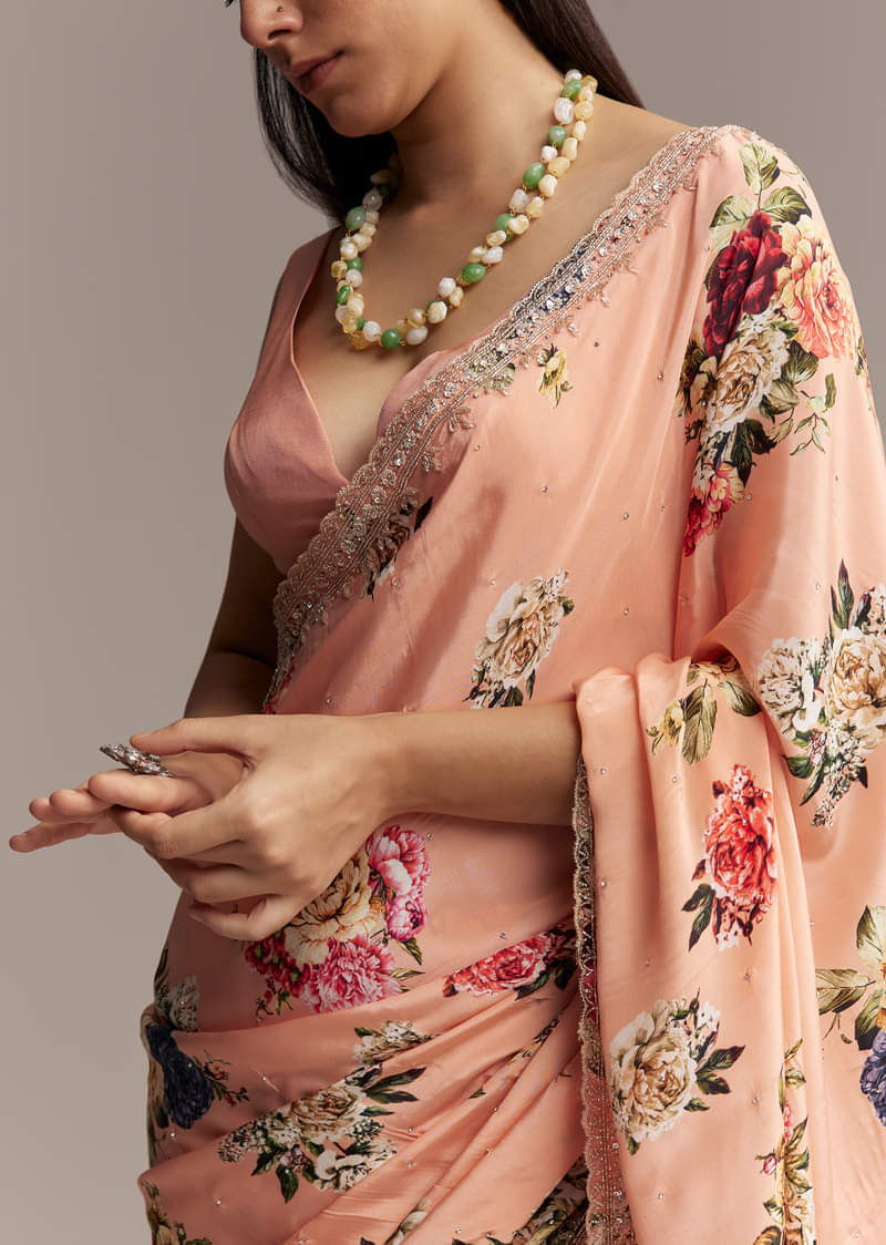 Peach Crepe Saree With Multicolor Floral Print And Embroidered Border