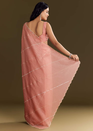 Peach Crush Tissue Saree With Cutdana And Beads Scallop Border