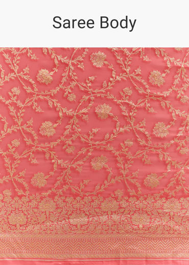 Peach Georgette Woven Saree With Floral Jaal And Heavy Border