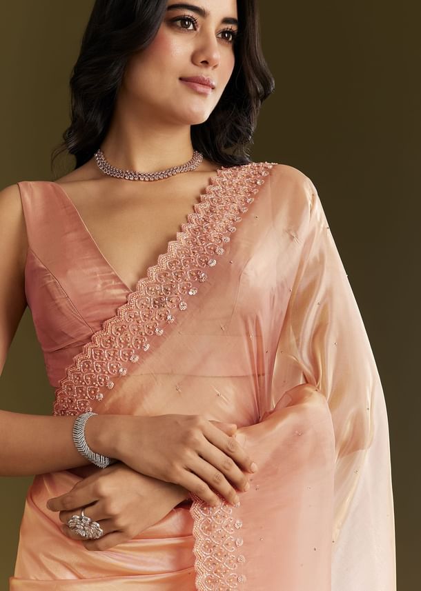 Peach Organza Saree With Stone Embellishment And Scallop Border