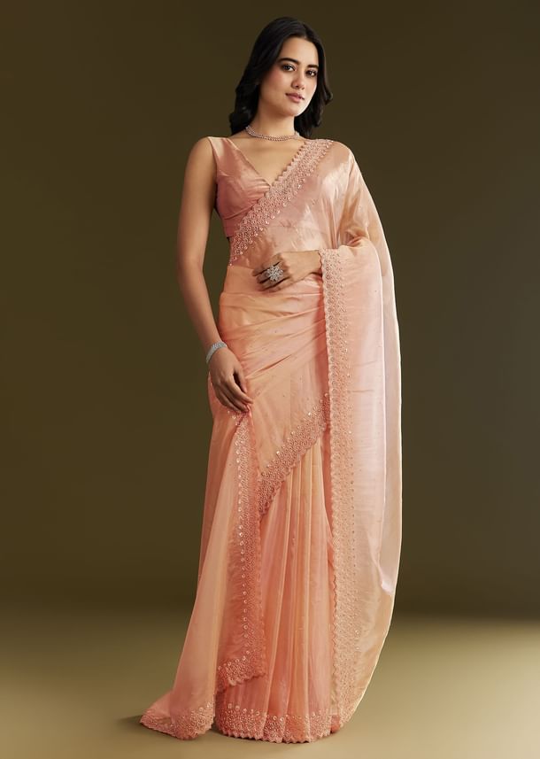 Peach Organza Saree With Stone Embellishment And Scallop Border