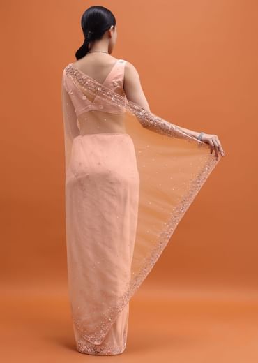 Powder Pink Embroidered Net Saree With Unstitched Blouse