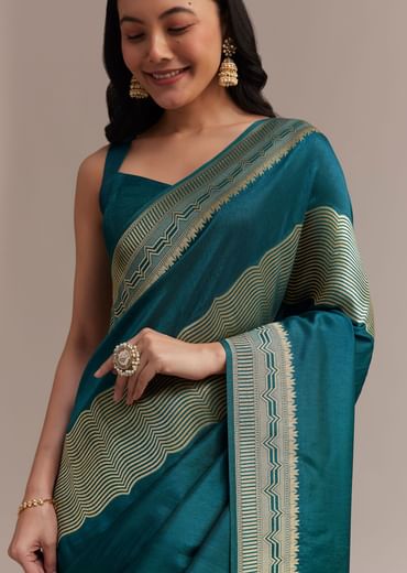Peacock Blue Dola Silk Saree With All Over Zari Weaving