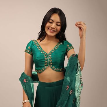 Peacock Green Blouse In Raw Silk With Zardosi Embroidery And A Diamond Cut Out On The Back