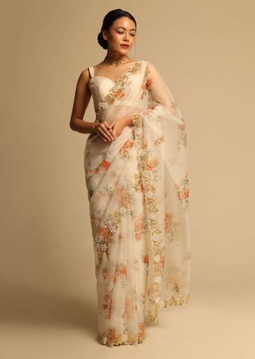Pearl White Saree In Organza With Floral Print All Over And Moti Embroidered Border Along With Unstitched Blouse