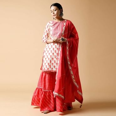 Pink And White Sharara Suit With Printed Floral Buttis And Detailed Using Zari And Gotta Lace