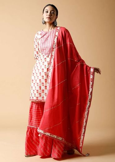 Pink And White Sharara Suit With Printed Floral Buttis And Detailed Using Zari And Gotta Lace