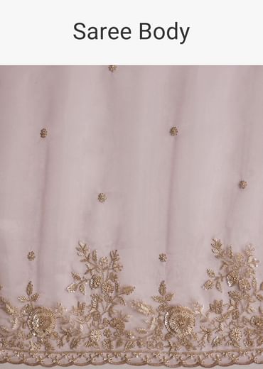 Pink Tissue Saree Adorned With Scallop Border And Heavy Embroidery