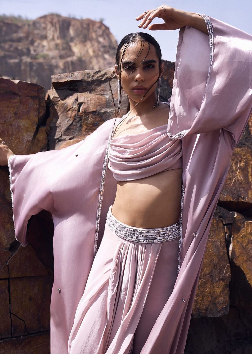 Pink cowl blouse with draped skirt and jacket