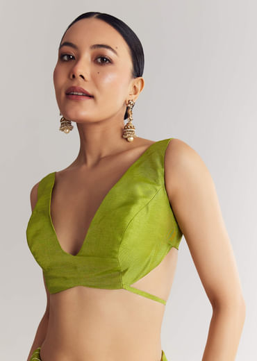 Pista Green Saree With Lehariya Print And Floral Gotapatti And Moti Work.