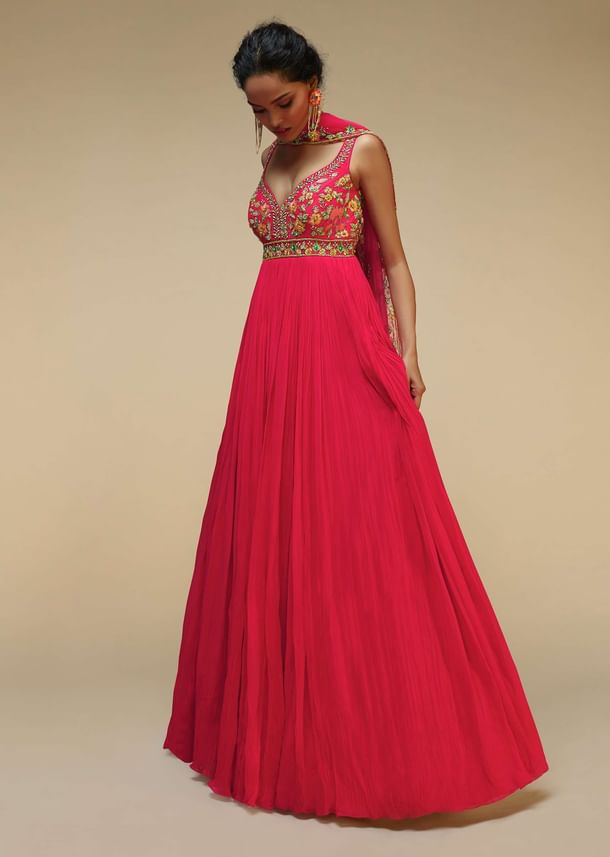 Rani Pink Anarkali Suit In Crushed Georgette With A Hand Embroidered Bodice Adorned In Multi Colored Resham And Sequins Work Rani Pink Anarkali Suit In Crushed Georgette With A Hand Embroidered Bodice Adorned In Multi Colored Resham And Sequins Work