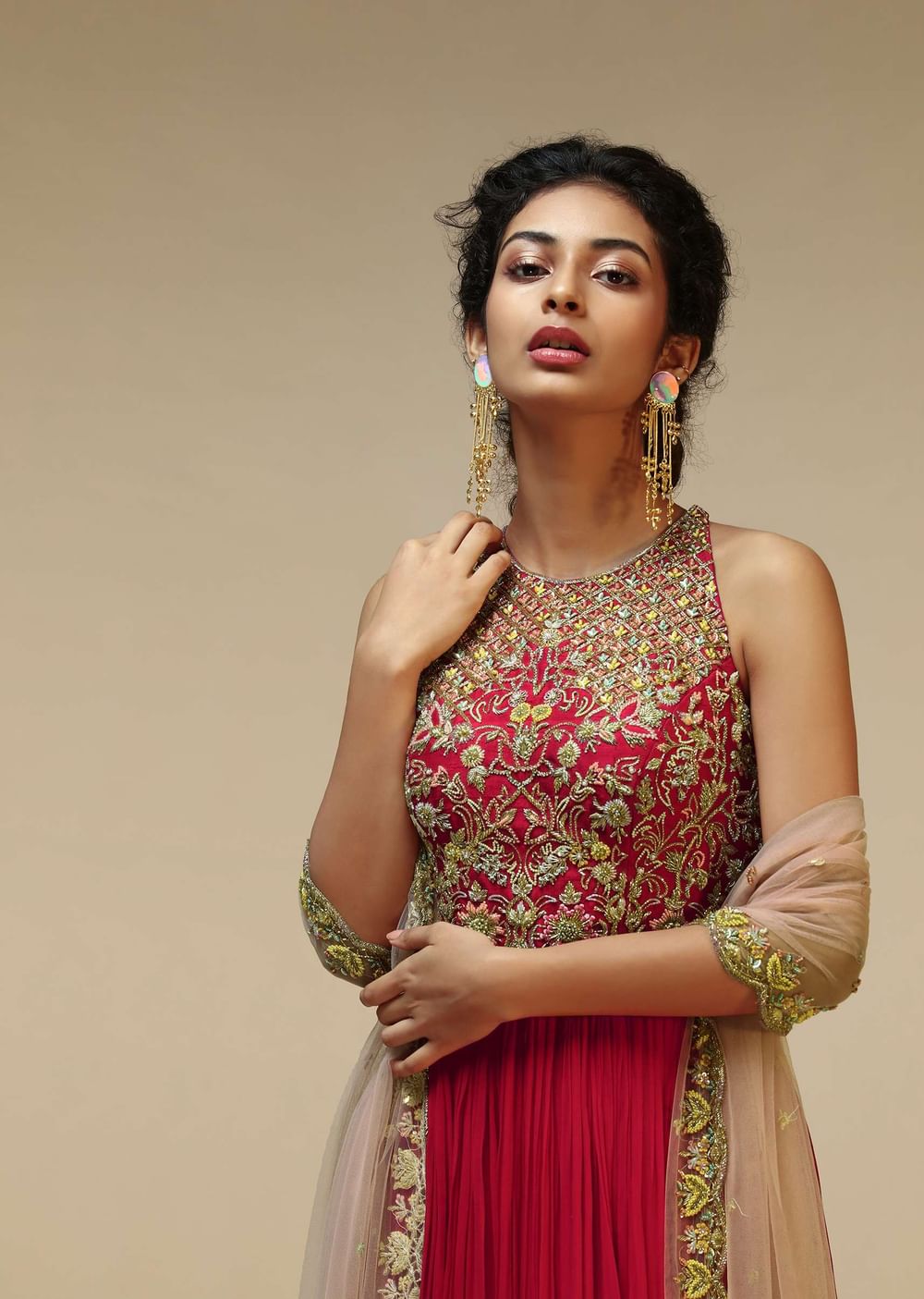 Rani Pink Anarkali Suit With Halter Neckline And Adorned In Multicolored Hand Embroidered Floral Design On The Bodice