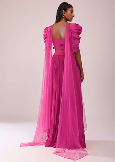Rani Pink Lehenga And Blouse With Bishop Sleeves And hand Embroidered Brooch