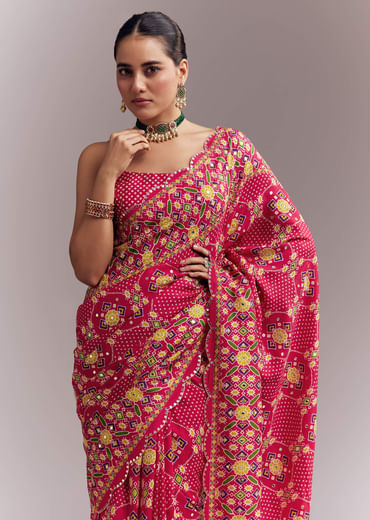 Rani Pink Satin Saree With Handwoven Ikat Print And Mirror Work