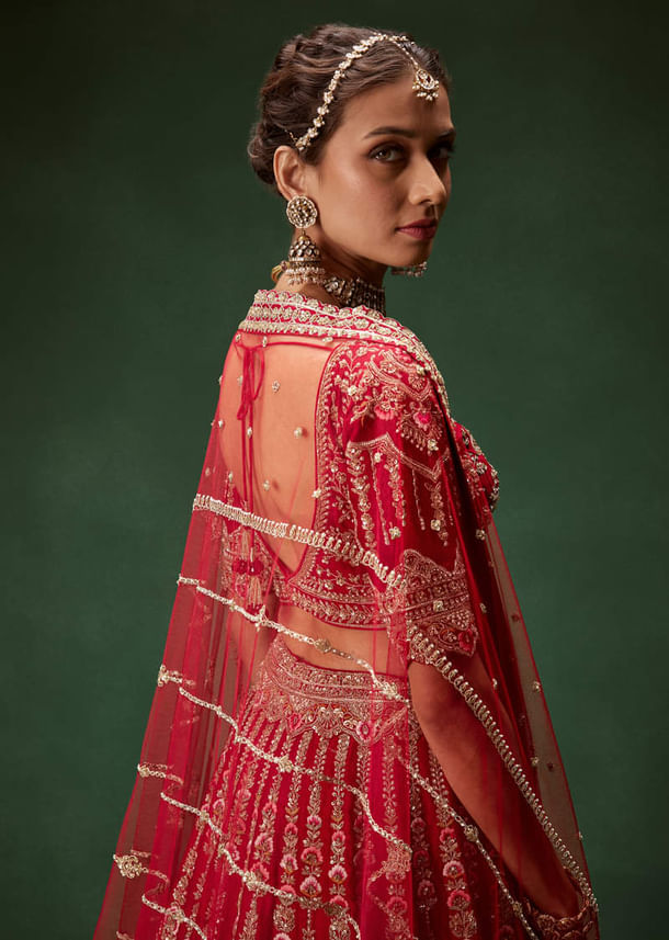 Red Bridal Lehenga With Intricate Hand Embroidery And Double Dupatta Drape