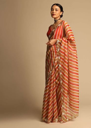 Red Saree In Organza With Striped Print All Over And Moti Embroidered Border Along With Unstitched Blouse