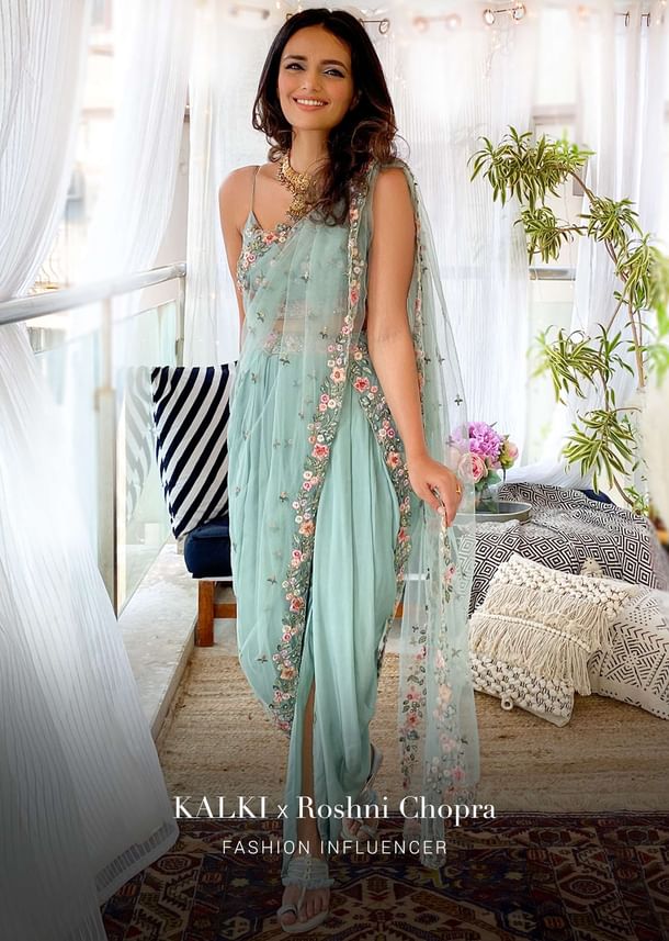 Roshni Chopra In Kalki Sage Green Dhoti Suit With A Raw Silk Crop Top Adorned Using Vibrant Resham Embroidered Summer Blooms Roshni Chopra In Kalki Sage Green Dhoti Suit With A Raw Silk Crop Top Adorned Using Vibrant Resham Embroidered Summer Blooms