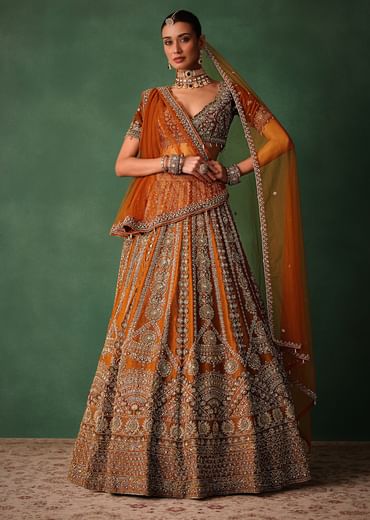 Rust Embroidered Bridal Lehenga With Deep Neckline Blouse And Dupatta