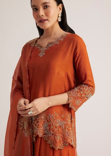 Rust Orange Palazzo Suit With Cutwork Detailing Rust Orange Palazzo Suit With Cutwork Detailing