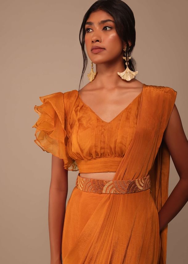 Rust Orange Saree With Fancy Ruffle Blouse And Embroidered Belt Rust Orange Saree With Fancy Ruffle Blouse And Embroidered Belt