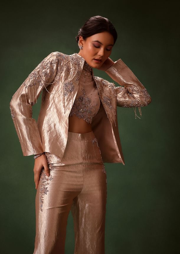 Rust Stretch Net Bell Bottom Set With Embroidered Blazer And Polo Neck Top