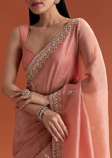 Rust Tissue Saree With Butti And Border Embroidery