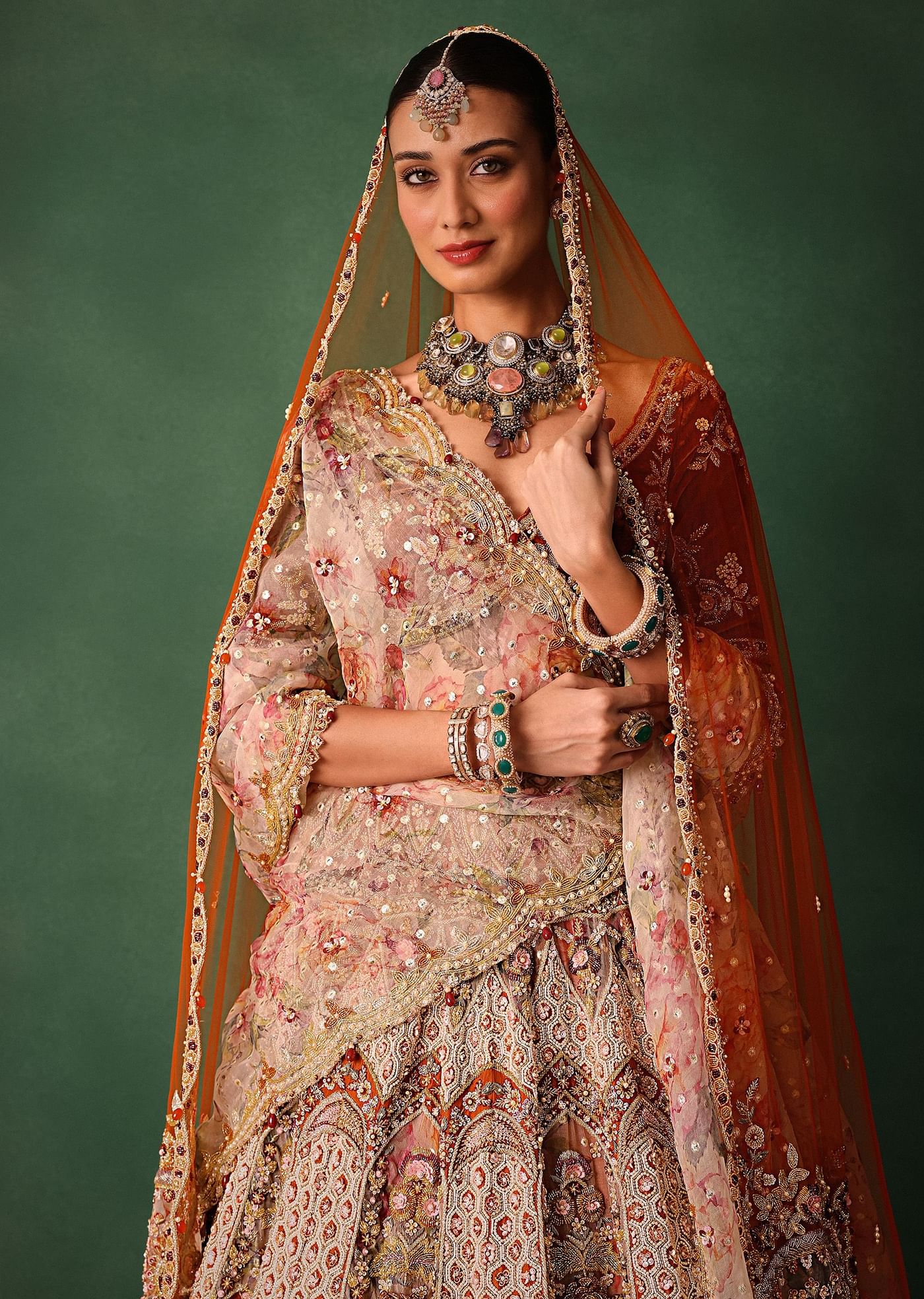 Rust V Neck Blouse With Heavy Jaal Cutdana Work Bridal Lehenga And Heavy Dupatta