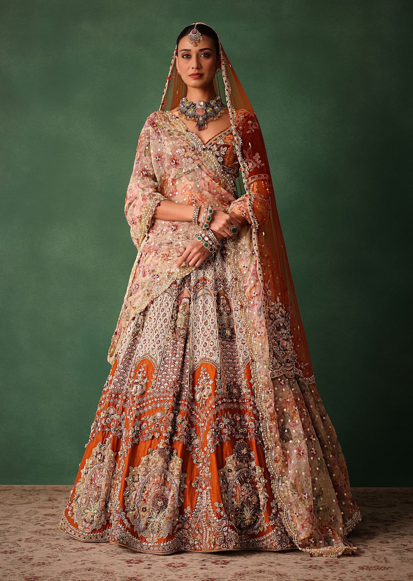 Rust V Neck Blouse With Heavy Jaal Cutdana Work Bridal Lehenga And Heavy Dupatta